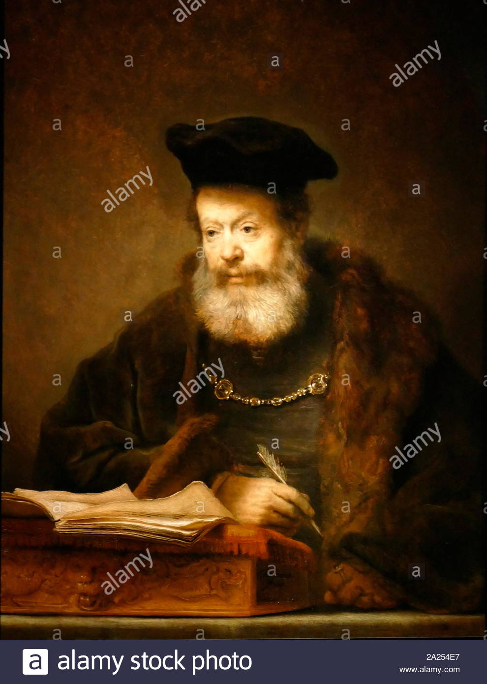 Le chercheur invité à sa table pour écrire. (1641) huile sur panneau peint par l'artiste hollandais, Rembrandt van Rijn (1606-69) Banque D'Images