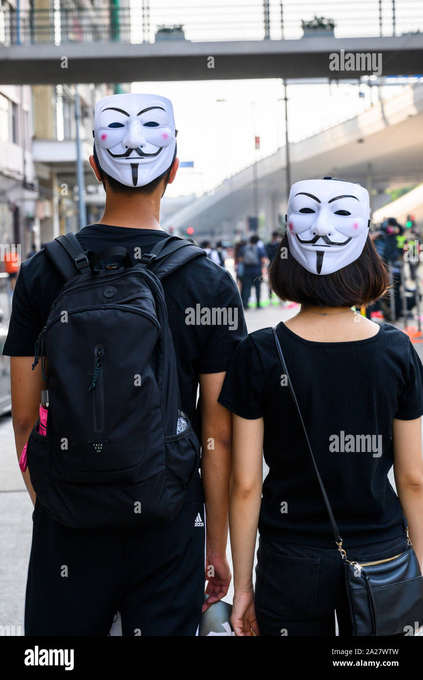 1 octobre 2019 manifestations de Hong Kong. Le 1 octobre des milliers de Hong Kong peoplee ont participé à une marche de protestation pacifique non autorisée de Causeway Bay à Shuen Wan de l'île de Hong Kong. Manifestants étudiants portant des masques de Guy Fawkes. Banque D'Images