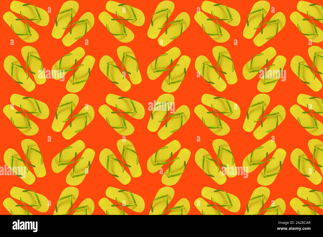 Modèle logique de tongs jaune sur un fond orange lumineux. Banque D'Images