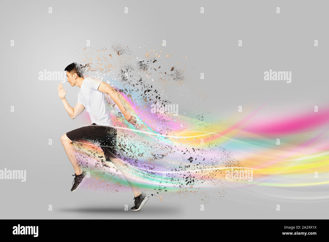 Jeune homme en marche avant avec speed concepts Banque D'Images