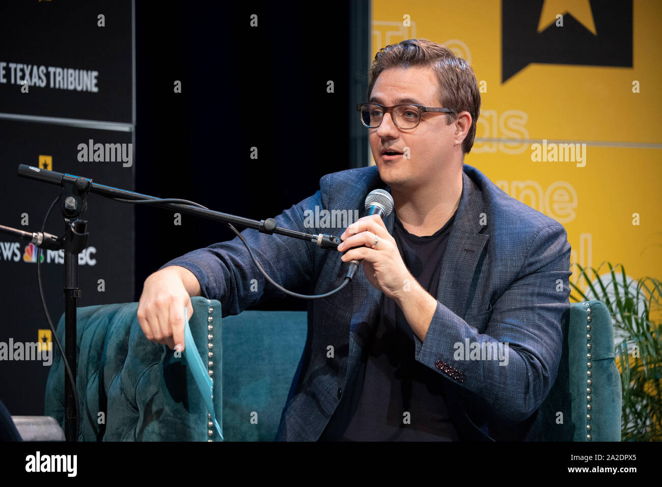 Journaliste Chris Hayes de MSNBC lance son podcast avec U.S. Sen. Ted Cruz du Texas au cours d'une session Festival Tribune du Texas à Austin, Texas. Banque D'Images