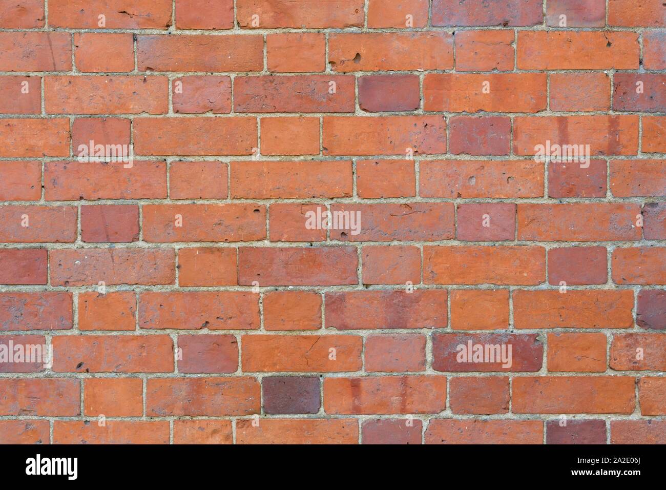 Mur texture background de briques rouge et orange Banque D'Images