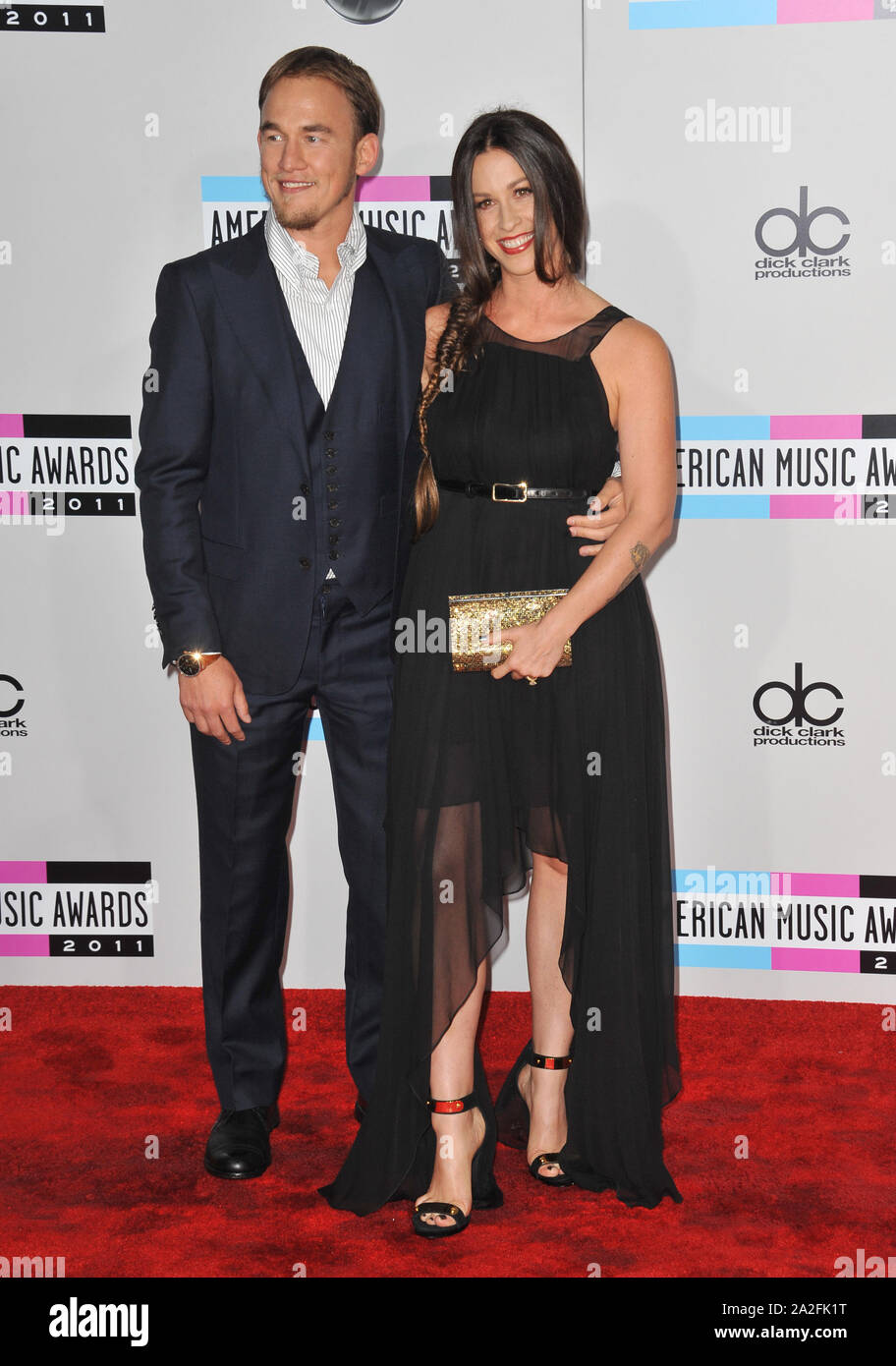 LOS ANGELES, CA. 20 novembre 2011 : Alanis Morissette & Mario Treadway arrivant à la 2011 American Music Awards au Nokia Theatre, LOS ANGELES. Vivre dans le centre-ville de Los Angeles. © 2011 Paul Smith / Featureflash Banque D'Images