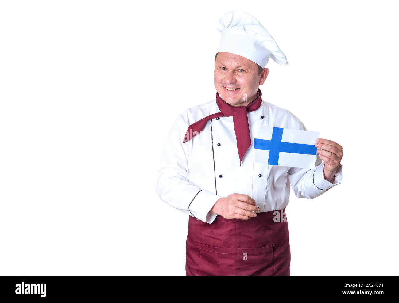 Mâle mature cuisinier avec drapeau Finlande isolé sur un fond blanc. Banque D'Images