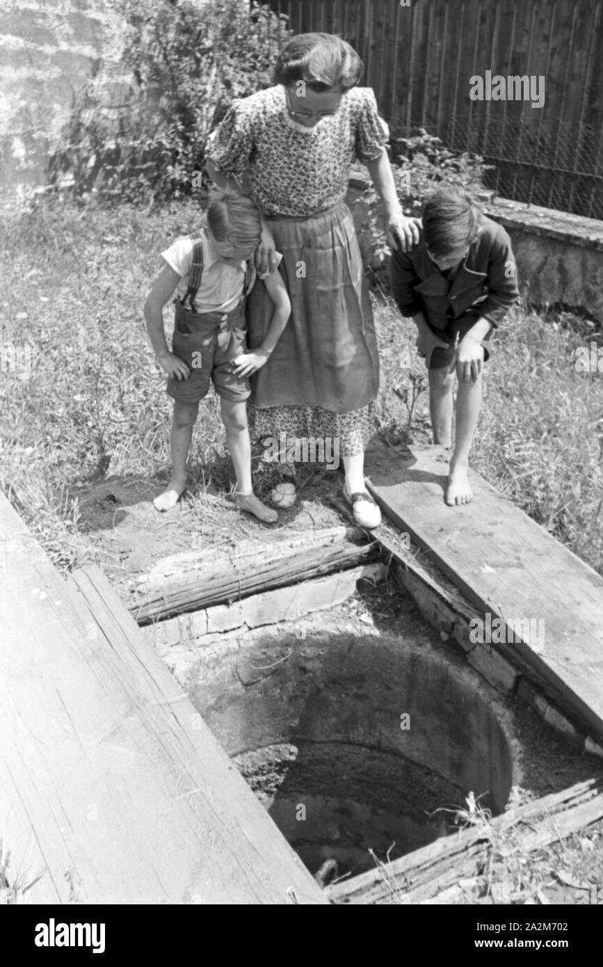 Befeuerter Gaz mit Ein Haushalt, Deutsches Reich 1930er Jahre. Un gaz courts de ménage, Allemagne 1930. Banque D'Images