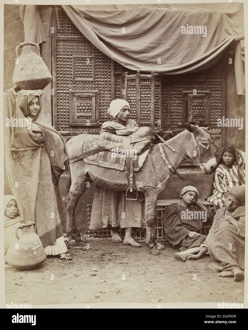 Artiste anonyme, âne, garçons, 19e siècle, à l'albumine, de l'image : 10 × 8 pouces (25,4 × 20,3 cm Banque D'Images