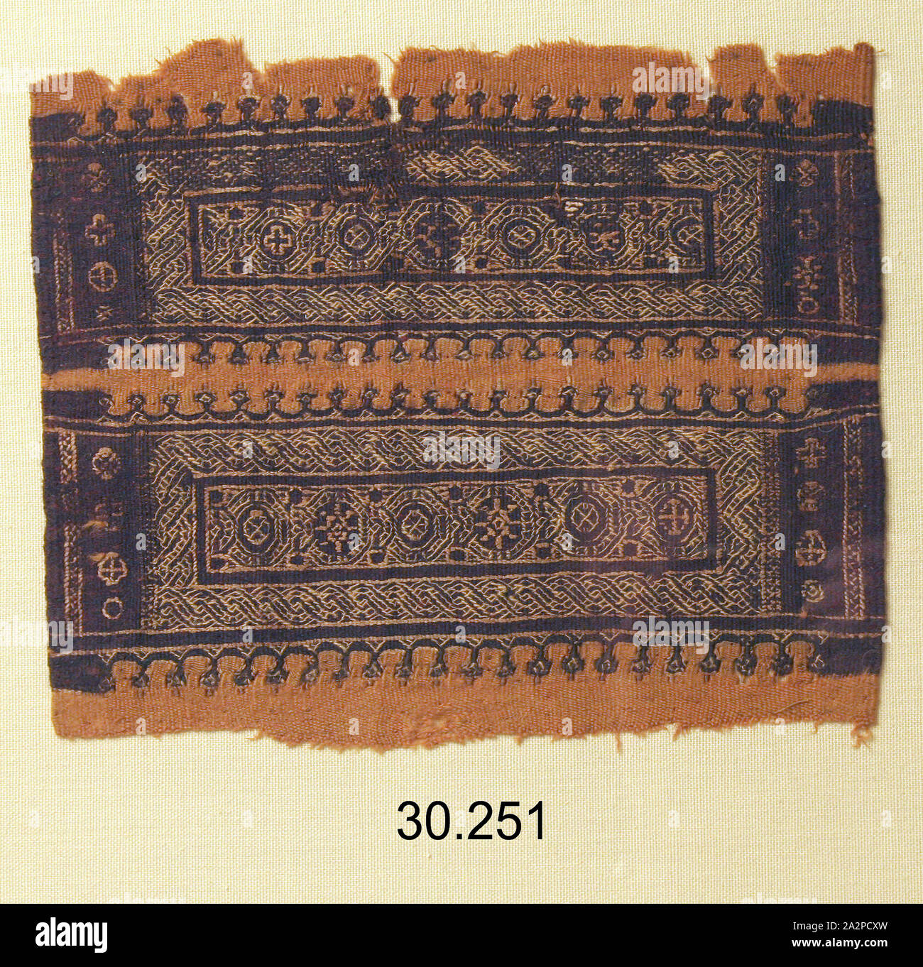 Le copte, l'Égyptien, à la frontière de la tapisserie, ch. 5ème/6ème siècle, avec un peu de laine lin., 22 x 25,6 cm Banque D'Images