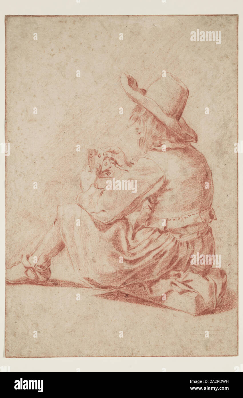 Inconnu (Néerlandais), un jeune homme jouant aux cartes, 17e siècle, craie rouge sur les traces de craie noire sur papier vergé chamois, feuille : 11 1/4 x 7 5/8 pouces (28,6 × 19,4 cm Banque D'Images