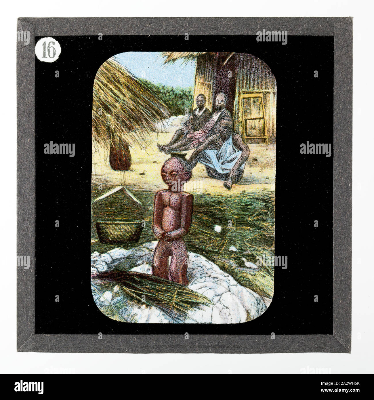 Diapositive - African Idol, de vie et de travail du Dr David Livingstone, vers 1900, diapositive illustrant une scène de village africain, il y a une idole dans l'avant-plan. Elle fait partie d'un ensemble incomplet de 40 diapositives, deux sont manquants, illustrant les faits marquants de la vie de Livingstone et de voyages. Ces diapositives ont été fabriqués par la London Stereoscopic & Photographic Company pour la Société Missionnaire de Londres, vers 1900. Le Dr David Livingstone (1813-1873) a passé trente ans Banque D'Images