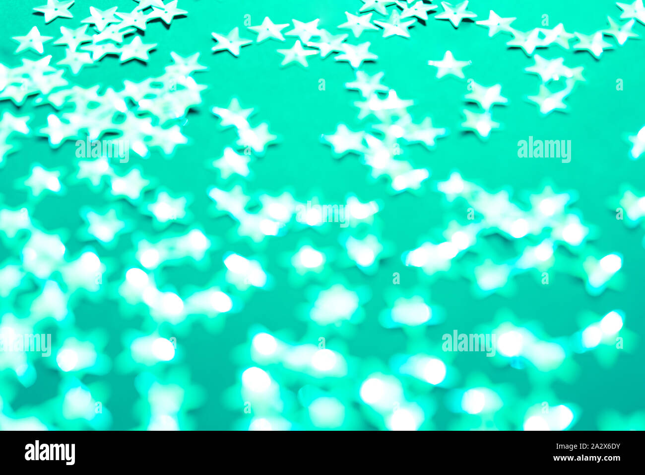 Étoile d'argent brille sur la toile. Concept de Noël. Banque D'Images