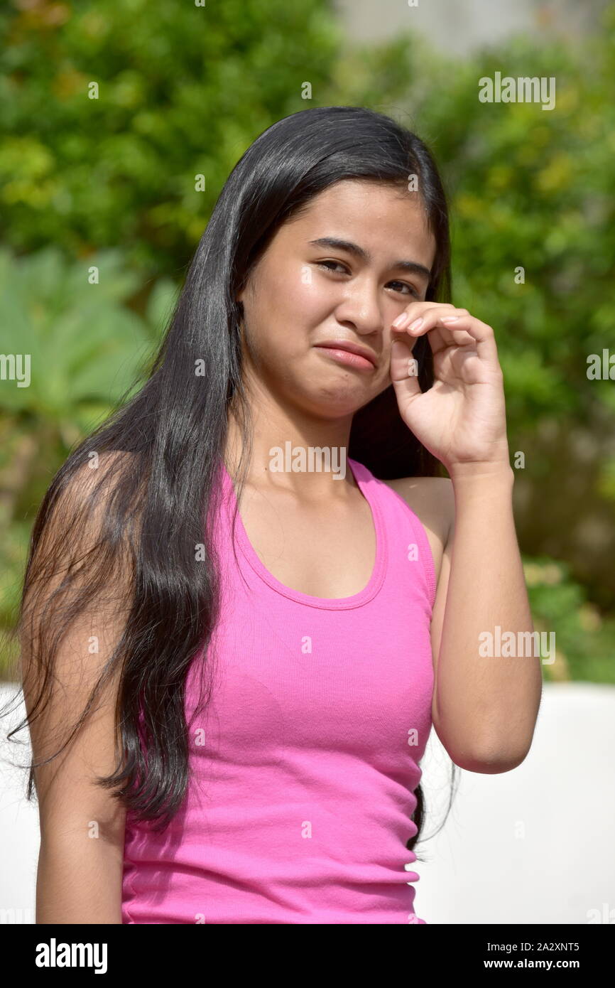 Une jeune fille en larmes Jeunesse Philippines Banque D'Images