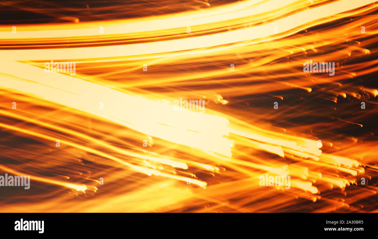 Un résumé de fond strie de lumière aux teintes chaleureuses. Banque D'Images