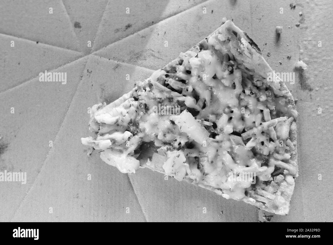 Pizza hawaïenne directement au-dessus de tourné en noir et blanc Banque D'Images