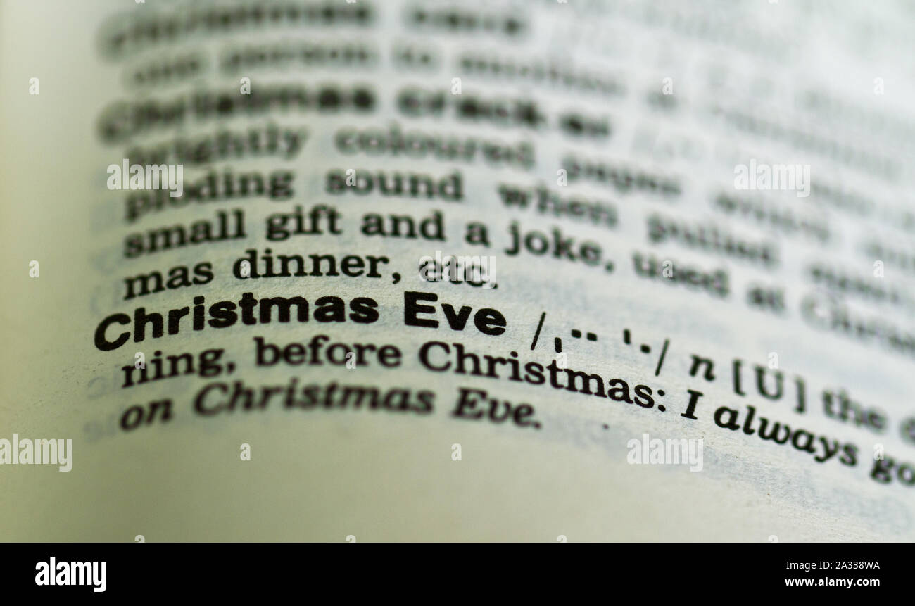 Le mot veille de Noël dans la vieille définition de dictionnaire loupe Banque D'Images