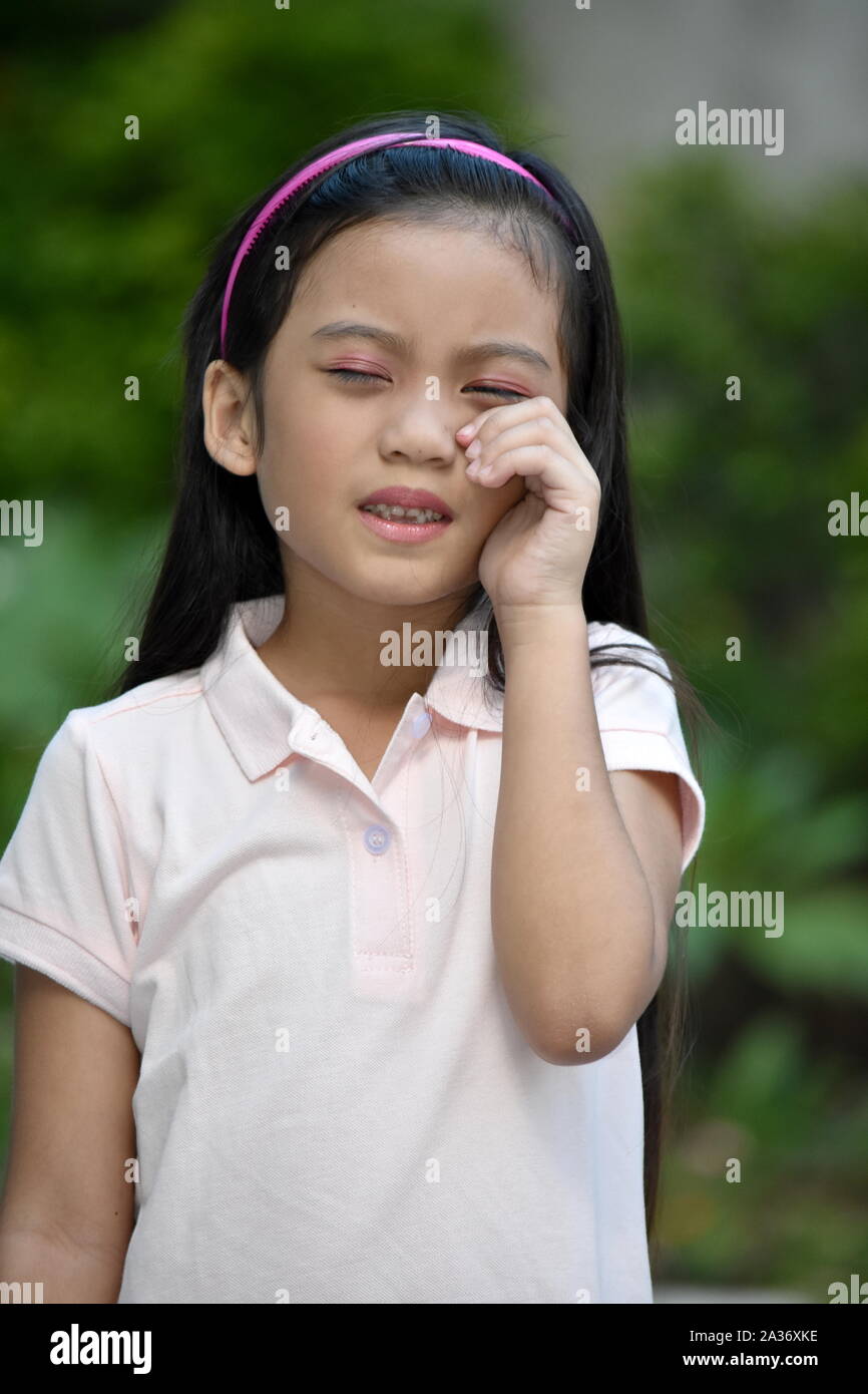 Une jeune asiatique avec des allergies Banque D'Images