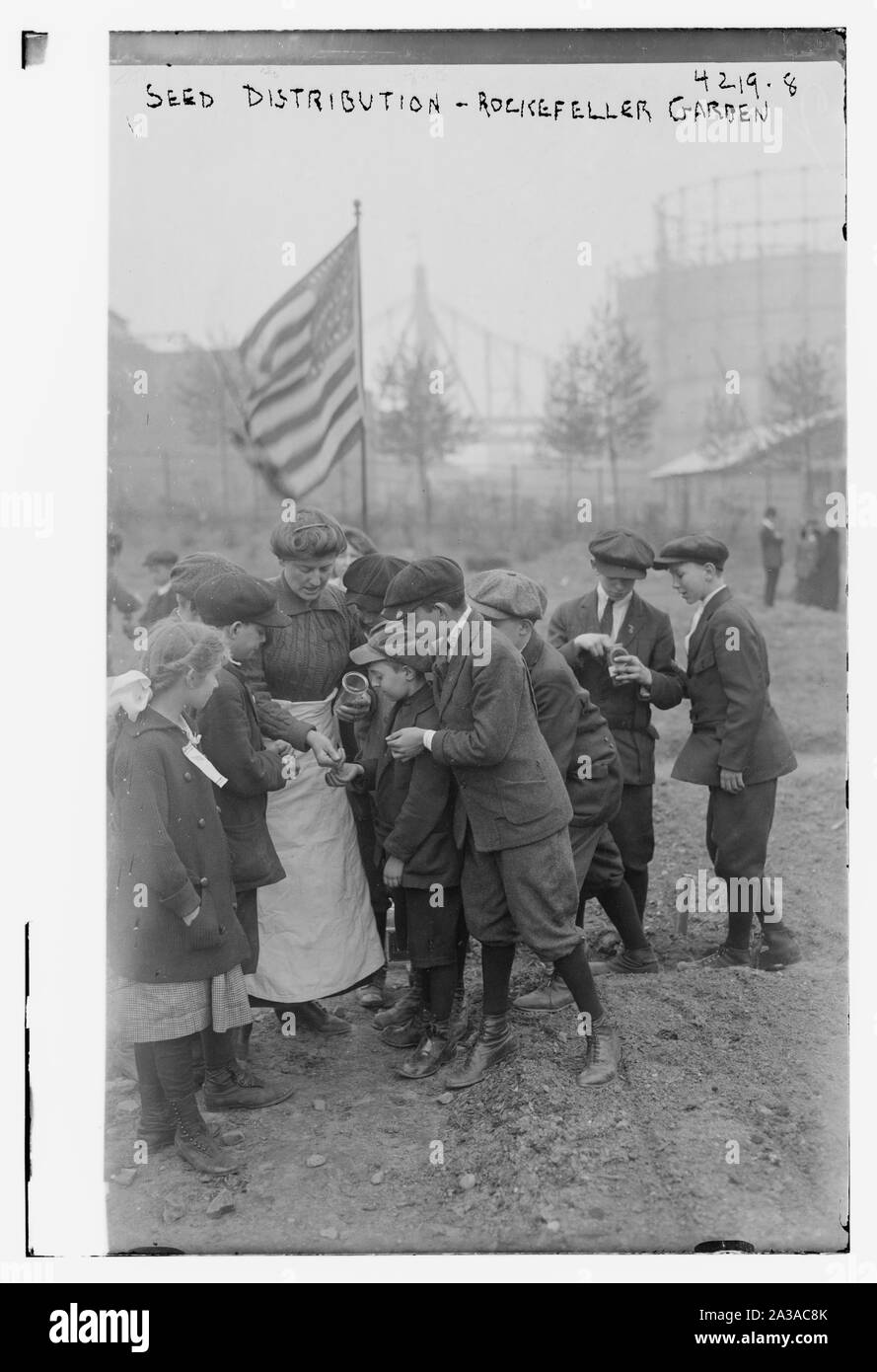 La distribution des semences -- jardin Rockefeller Banque D'Images