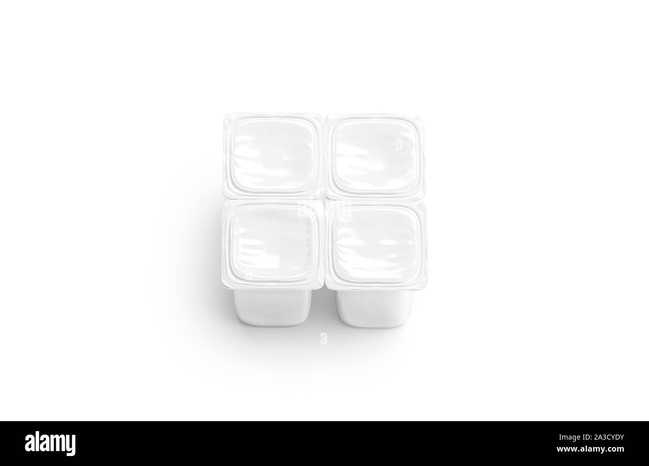 Maquette vierge de quatre boîtes de yaourt blanches, vue du dessus Banque D'Images
