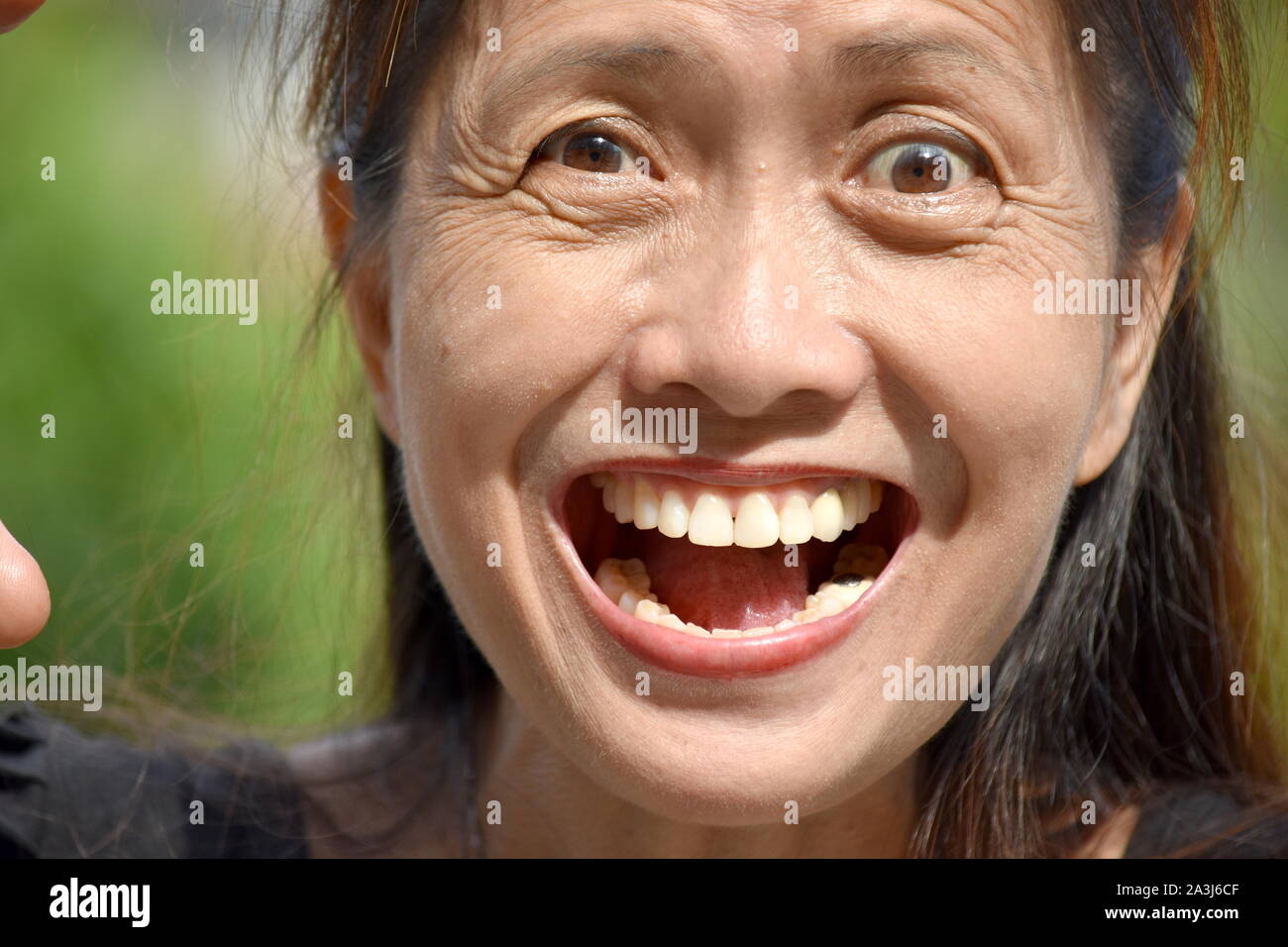 Une femme excitée hauts Gramma Banque D'Images