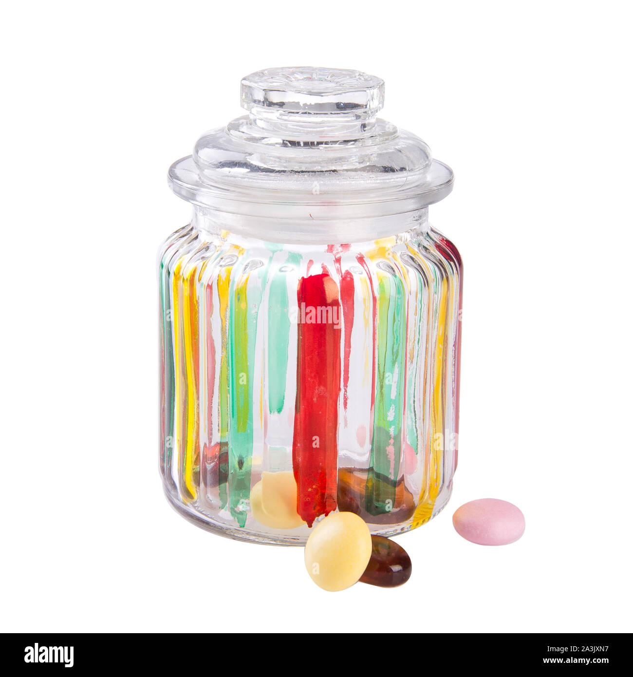 Bonbons bonbons colorés ou dans un bocal en verre sur l'arrière-plan Banque D'Images