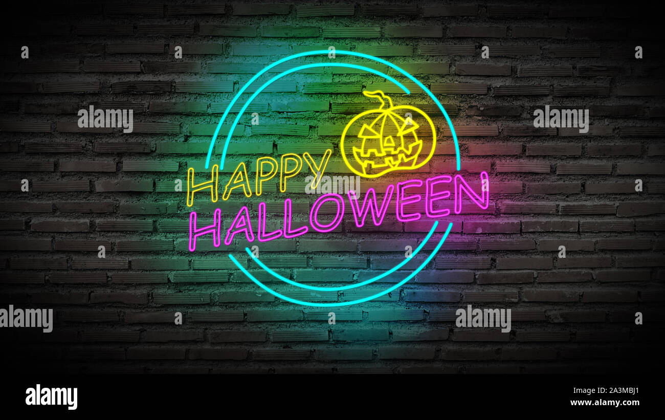 Happy Halloween Couleur néon lumineux pour partie avec des citrouilles sur mur de briques rétro arrière-plan. Banque D'Images