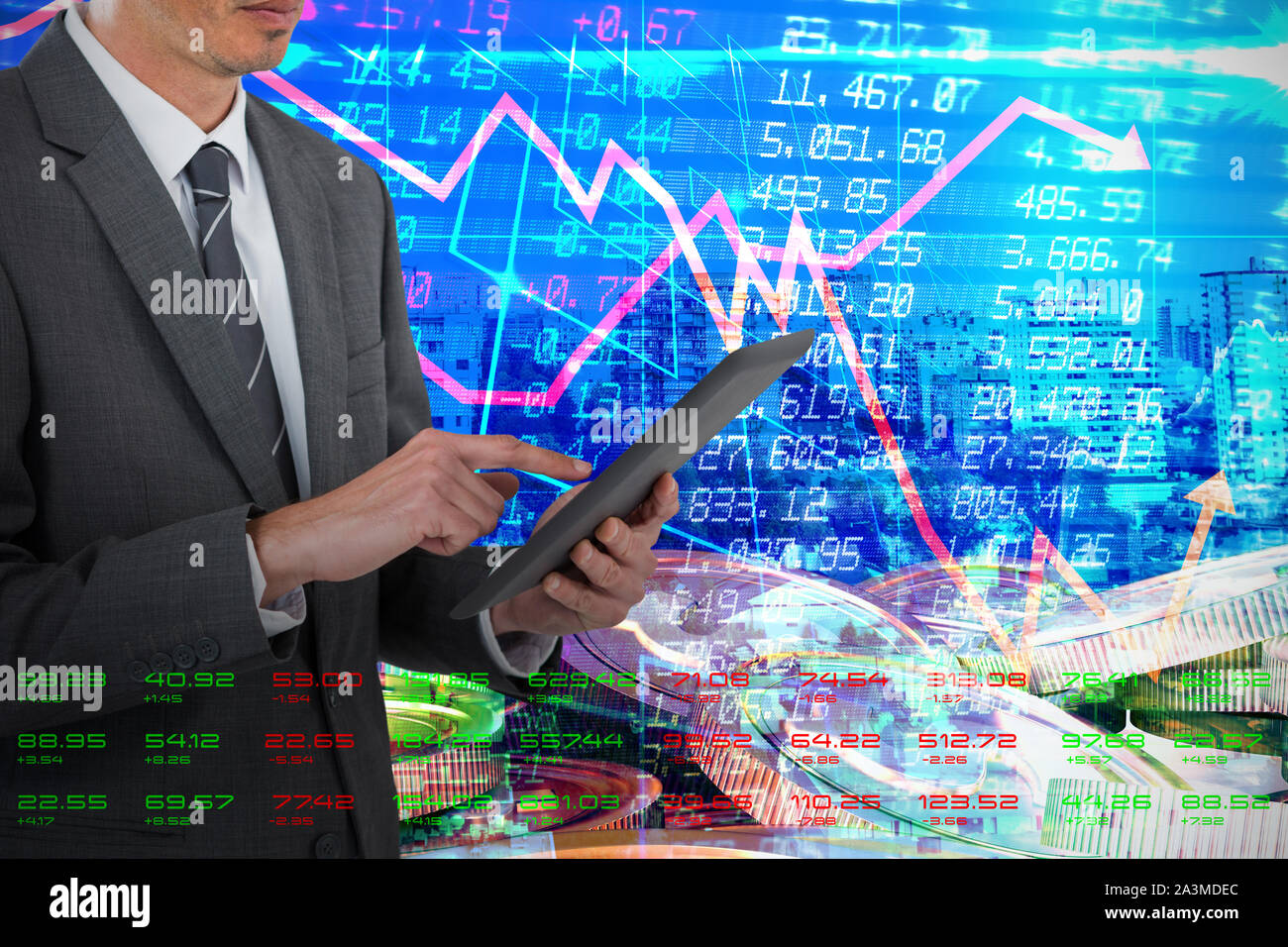 Image composite de portrait sophisticated businessman using digital tablet Banque D'Images