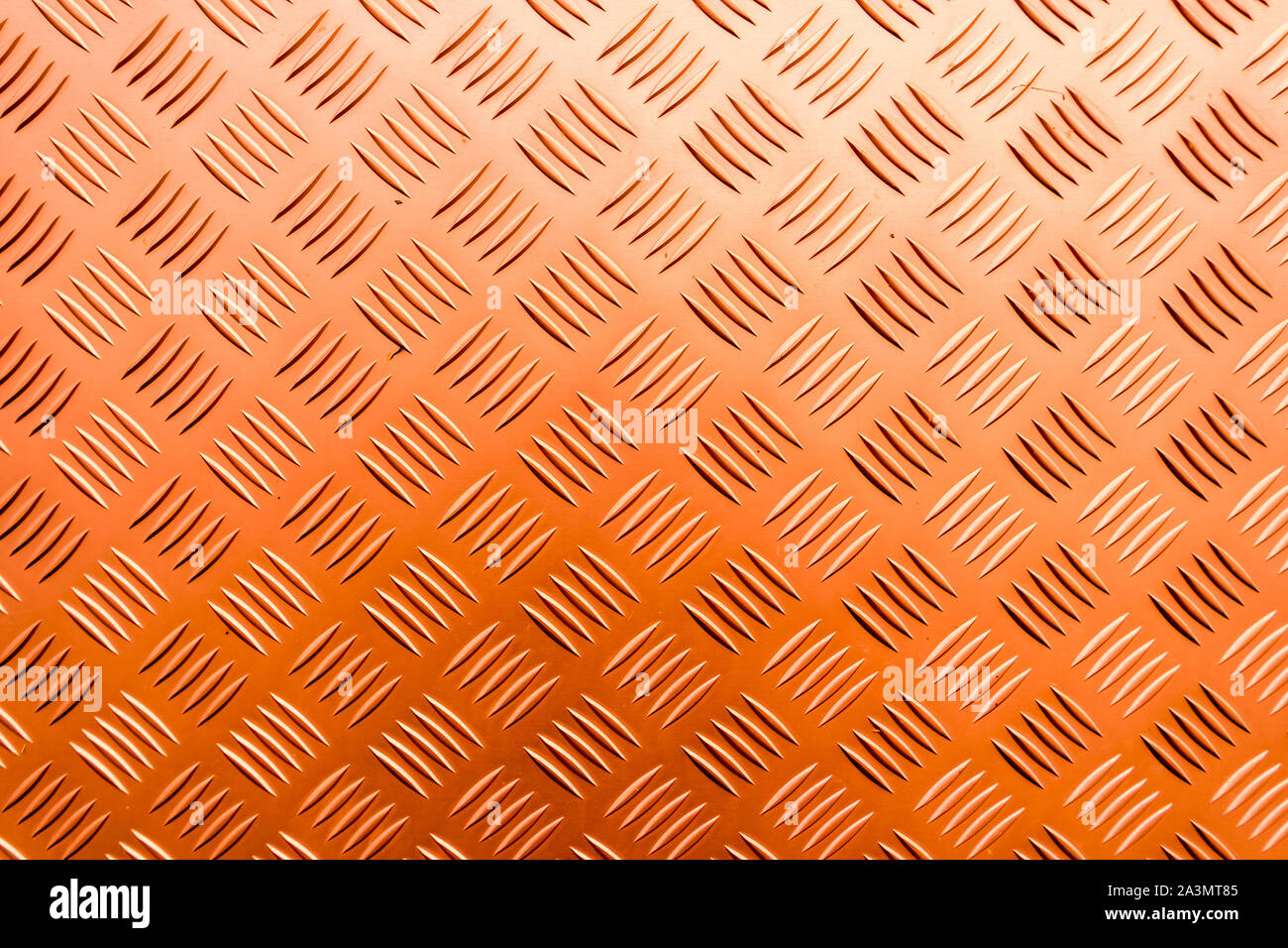 Checker plate Orange Banque D'Images