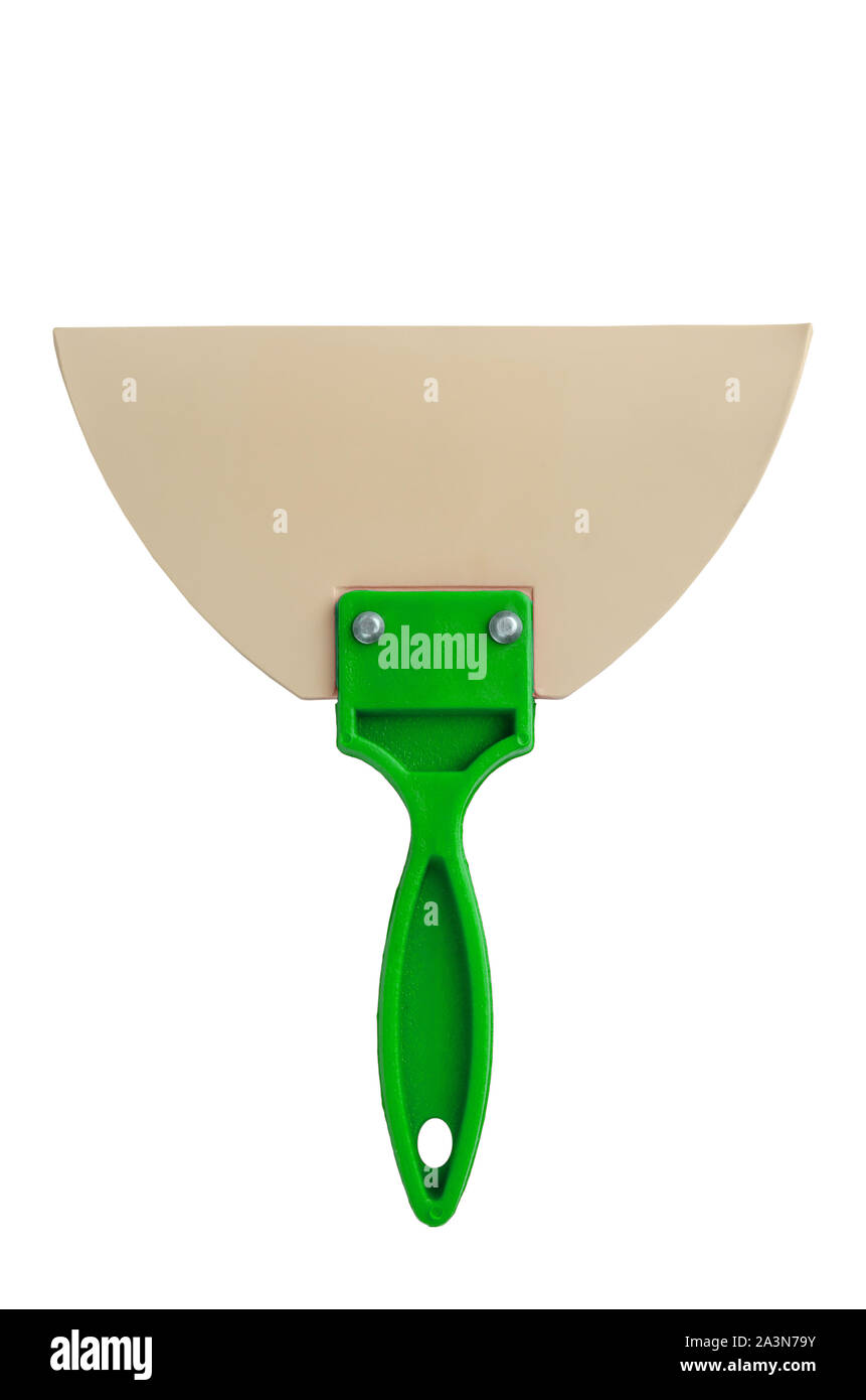 Spatule en caoutchouc avec une poignée verte pour le remplissage des joints isolated on white Banque D'Images