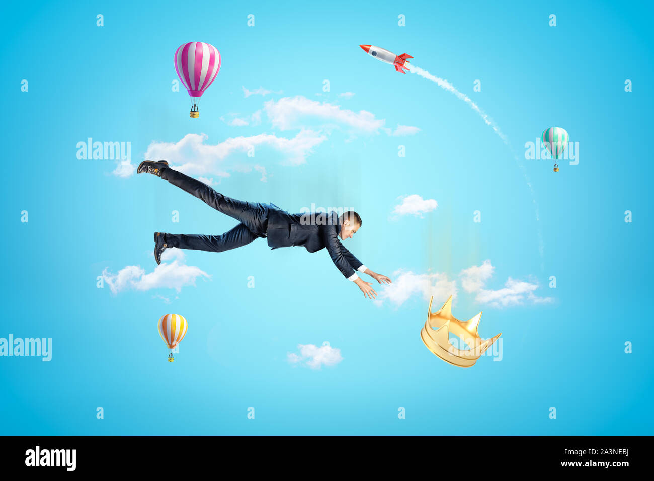 Businessman reaching à couronne d'or avec des ballons à air chaud et d'argent rouge fusée spatiale dans l'air sur fond bleu Banque D'Images