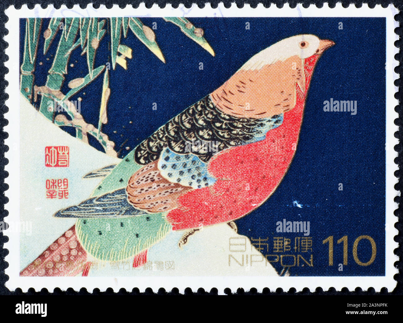 Peinture d'un faisan doré sur timbre japonais Banque D'Images
