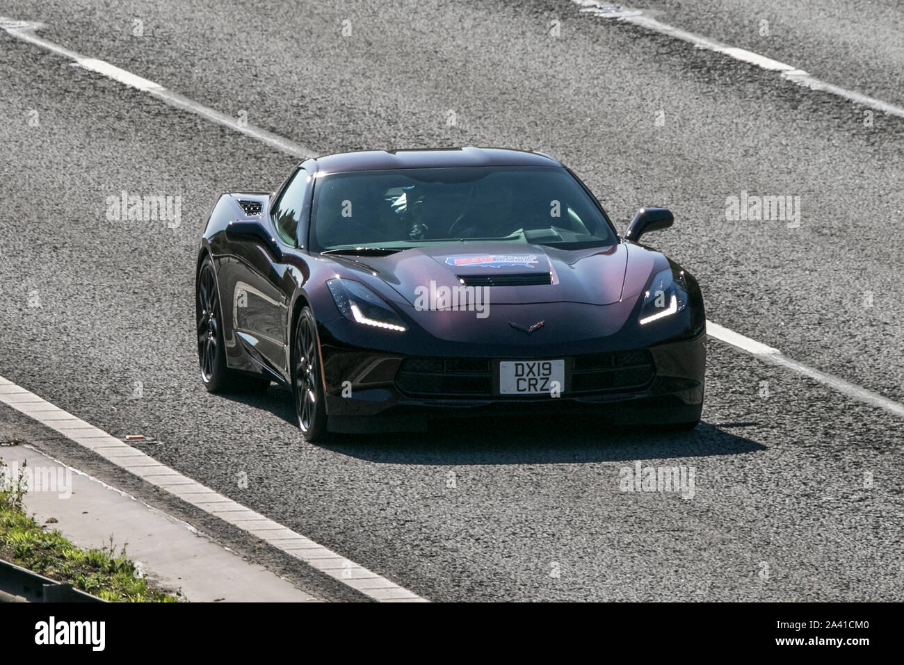 Corvette Chevrolet GMC 2019 rouge; sur l'autoroute M6 près de Preston à Lancashire, au Royaume-Uni Banque D'Images