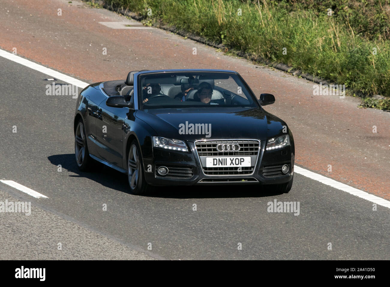 Audi A5 S Line Tdi voyageant sur l'autoroute M61, près de Manchester, Royaume-Uni Banque D'Images