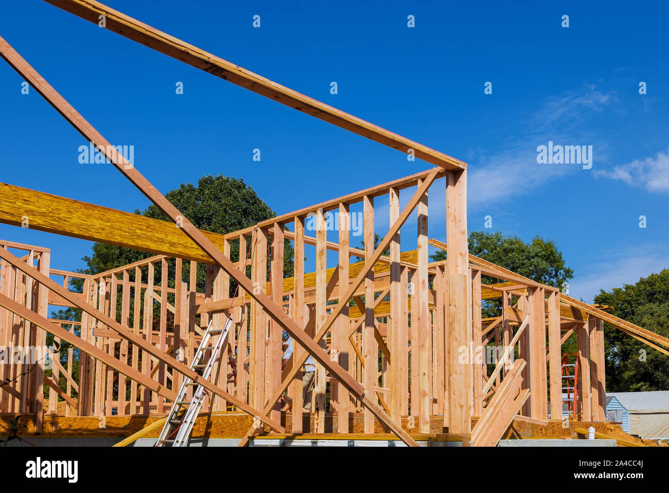 Nouvelle maison ossature construction maisons à toit de tuiles Banque D'Images