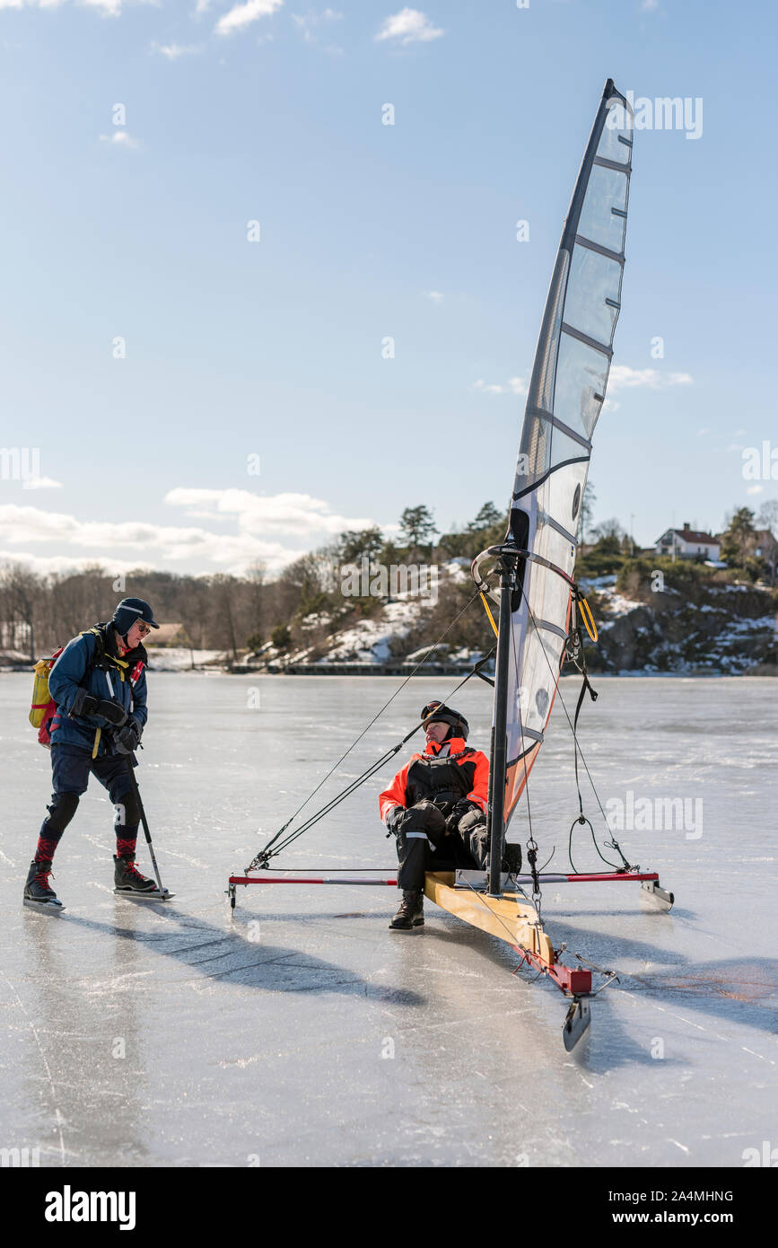 Les hommes sur la glace Banque D'Images