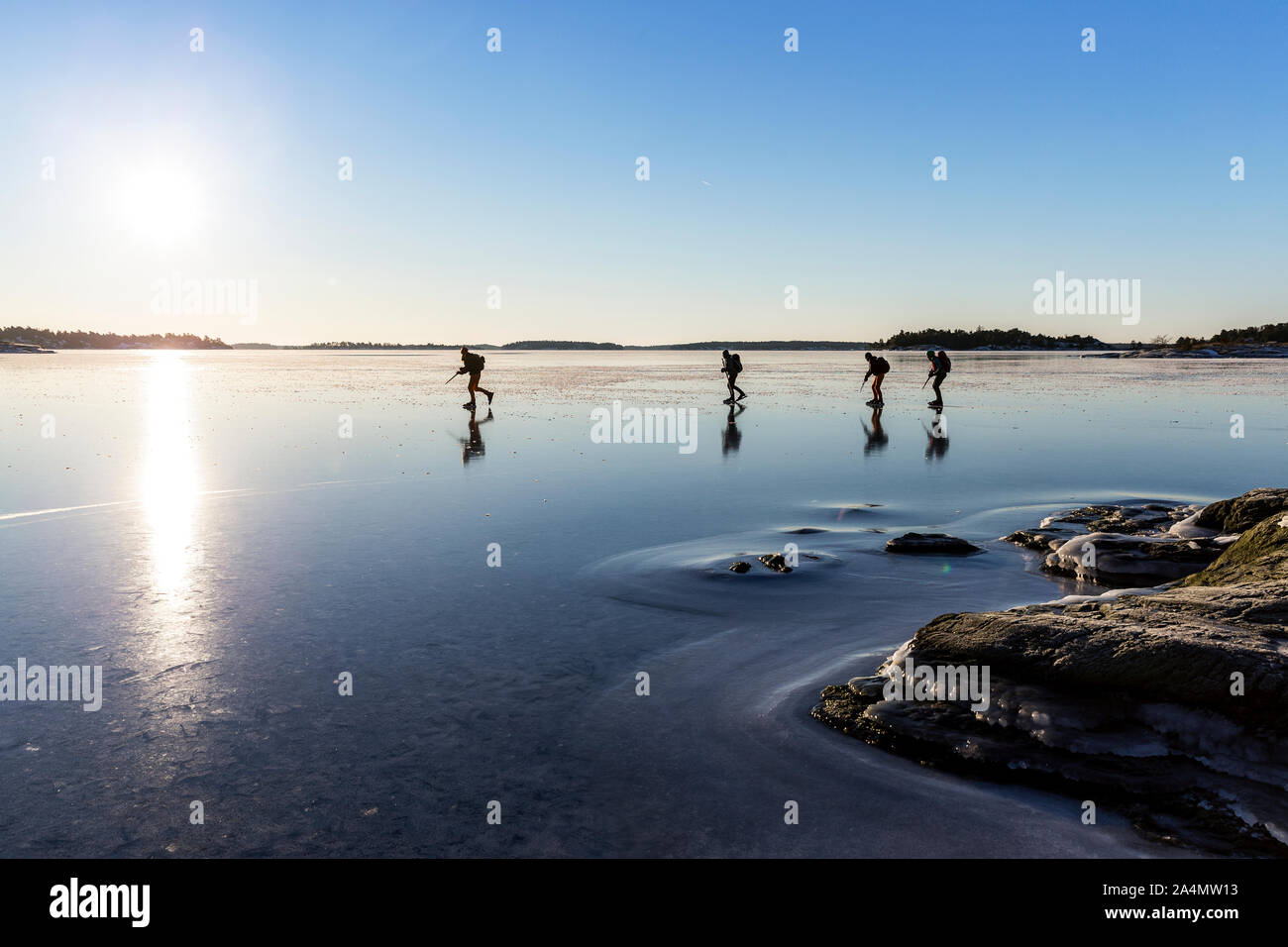 Silhouettes de personnes le patin à glace Banque D'Images