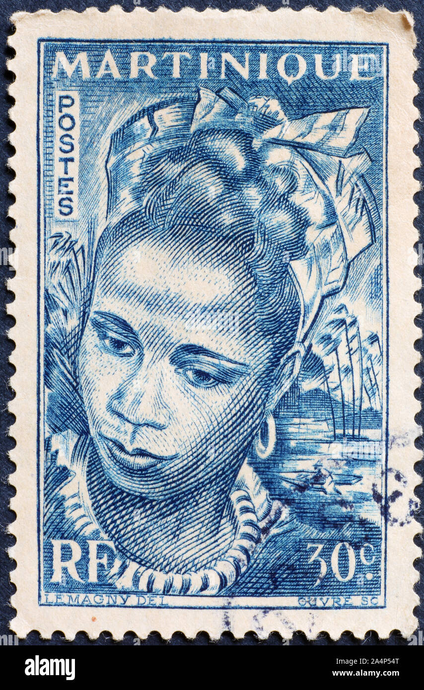 Portrait d'une femme sur vintage stamp de la Martinique Banque D'Images