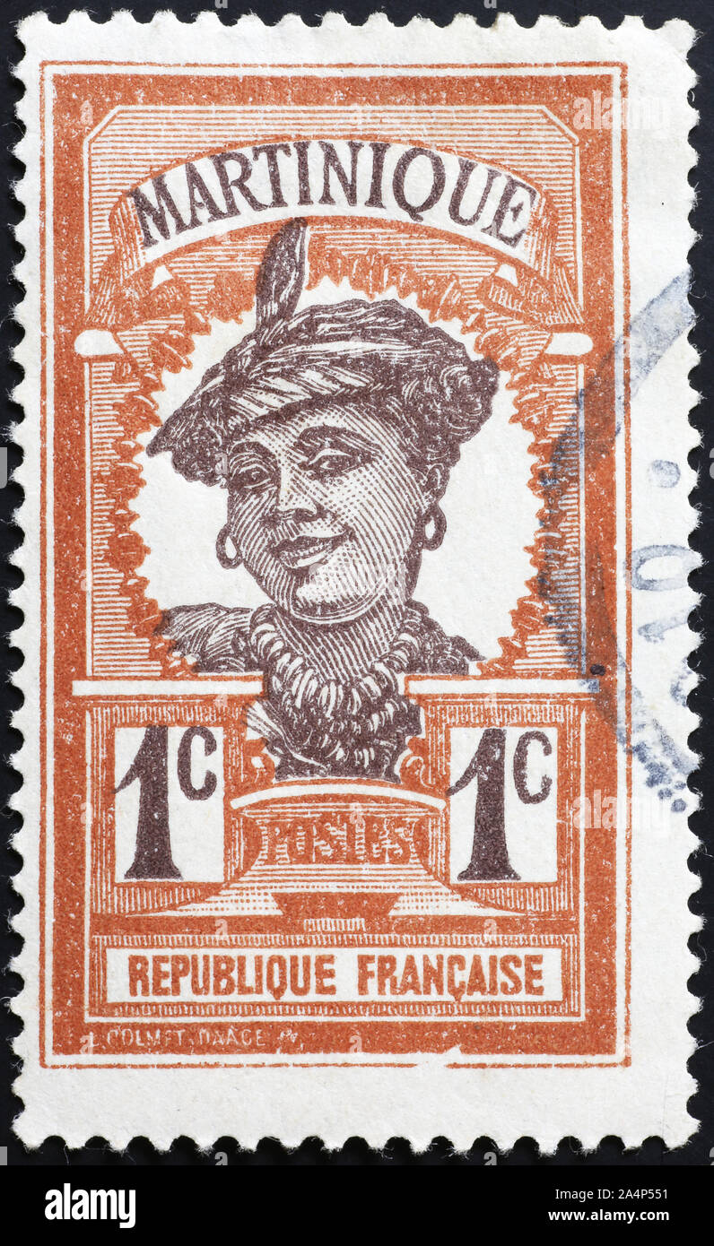 Portrait de femme au timbre-poste de Guadalupe Banque D'Images
