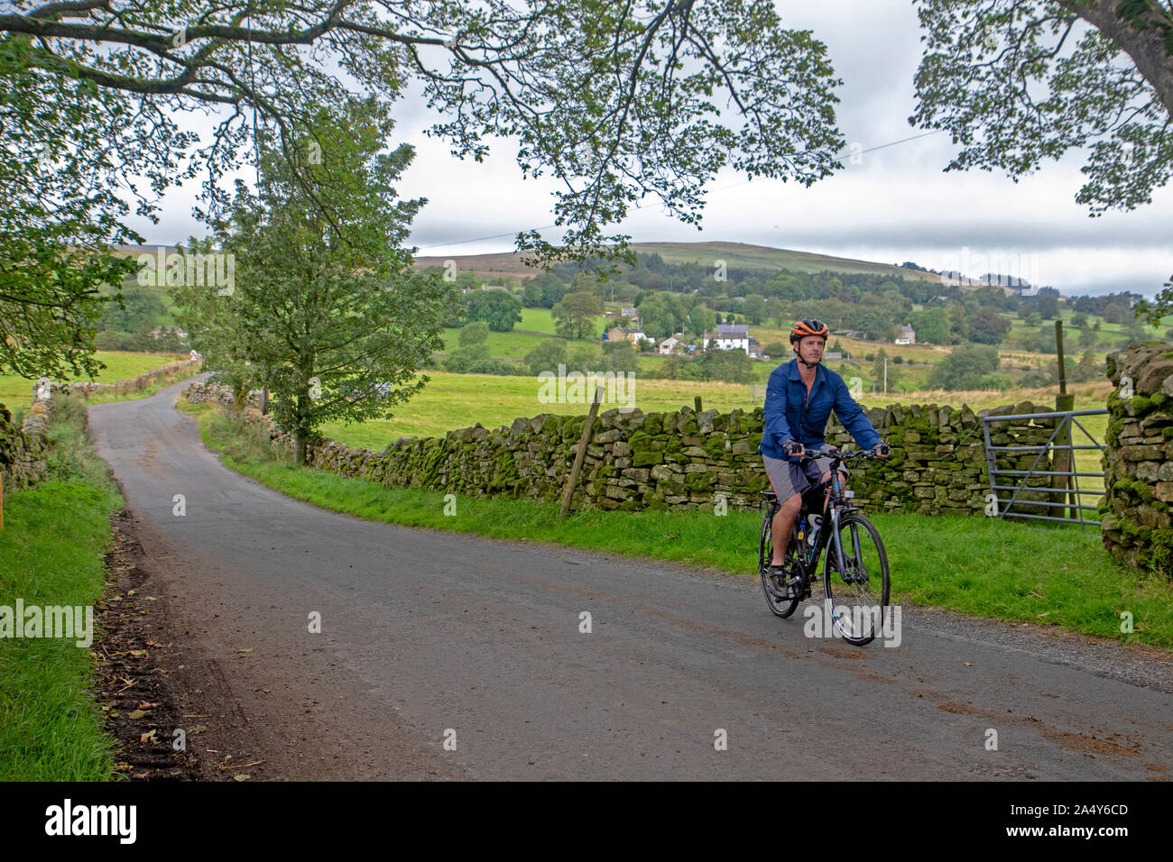 Faire du vélo à travers Alston Moor, partie de la côte à l'autre balade à vélo Banque D'Images