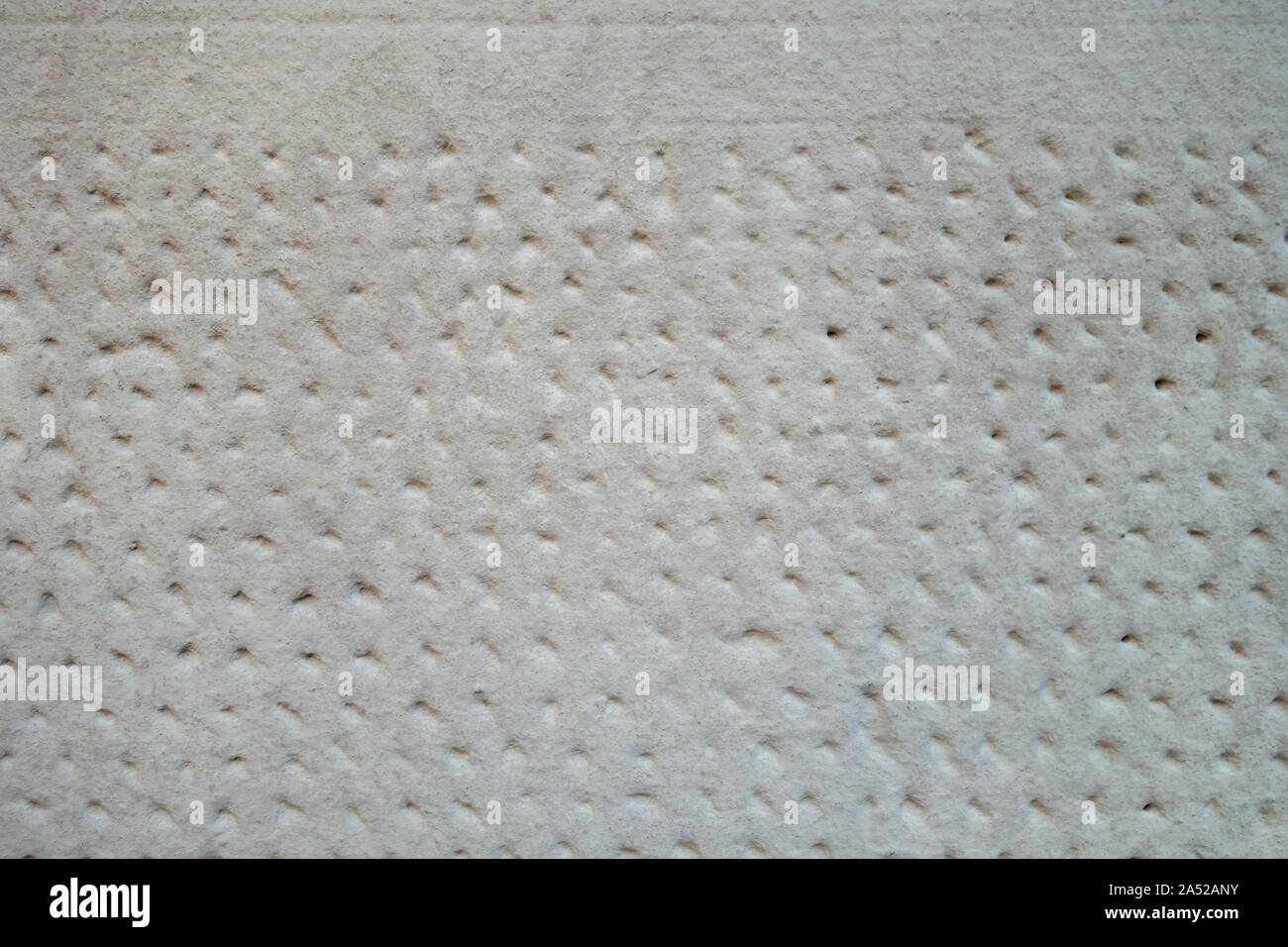 Mur de ciment gris blanc avec marques de modèle Banque D'Images