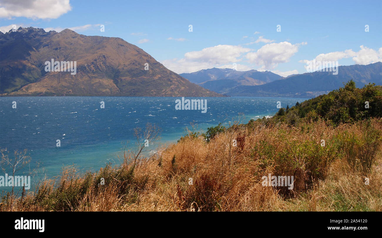 Les Alpes du Sud vu de la rive du lac Wakatipu, Nouvelle-Zélande Île du Sud Banque D'Images