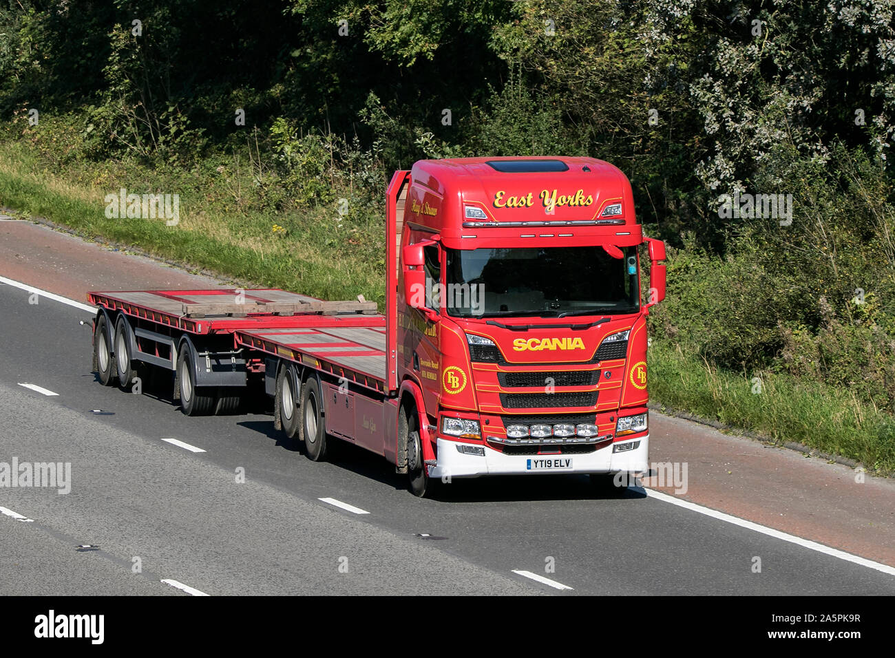 East Yorks transporteurs, l'unité et de la remorque Scania Tracot voyageant sur l'autoroute M6 près de Preston dans le Lancashire, Royaume-Uni Banque D'Images