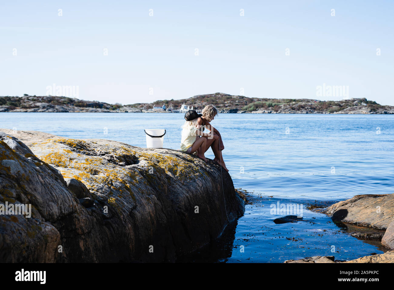 Pêche à la mère et fille Banque D'Images