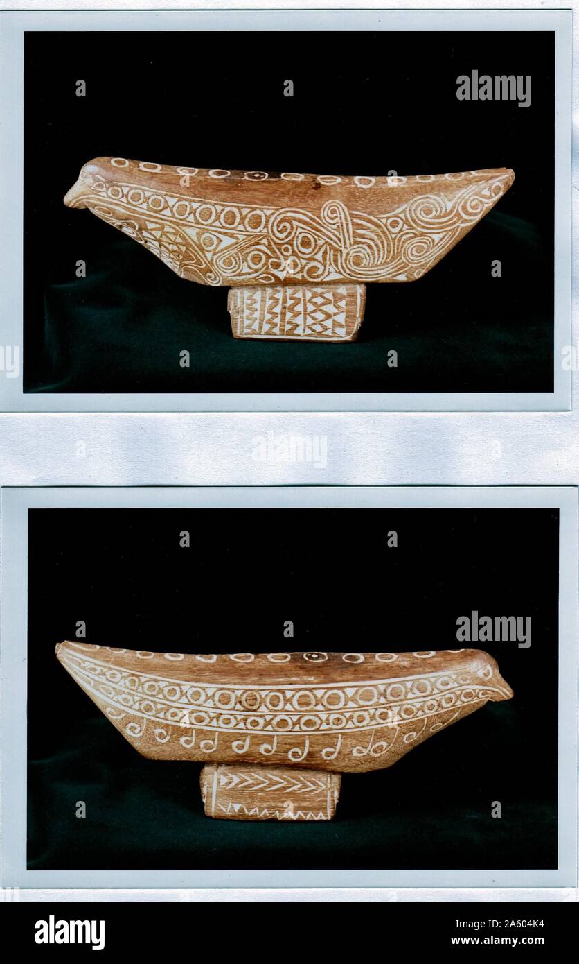 Tribal Art : appuie-tête en forme d'un oiseau, les îles Trobriand, Pacifique Sud. Banque D'Images