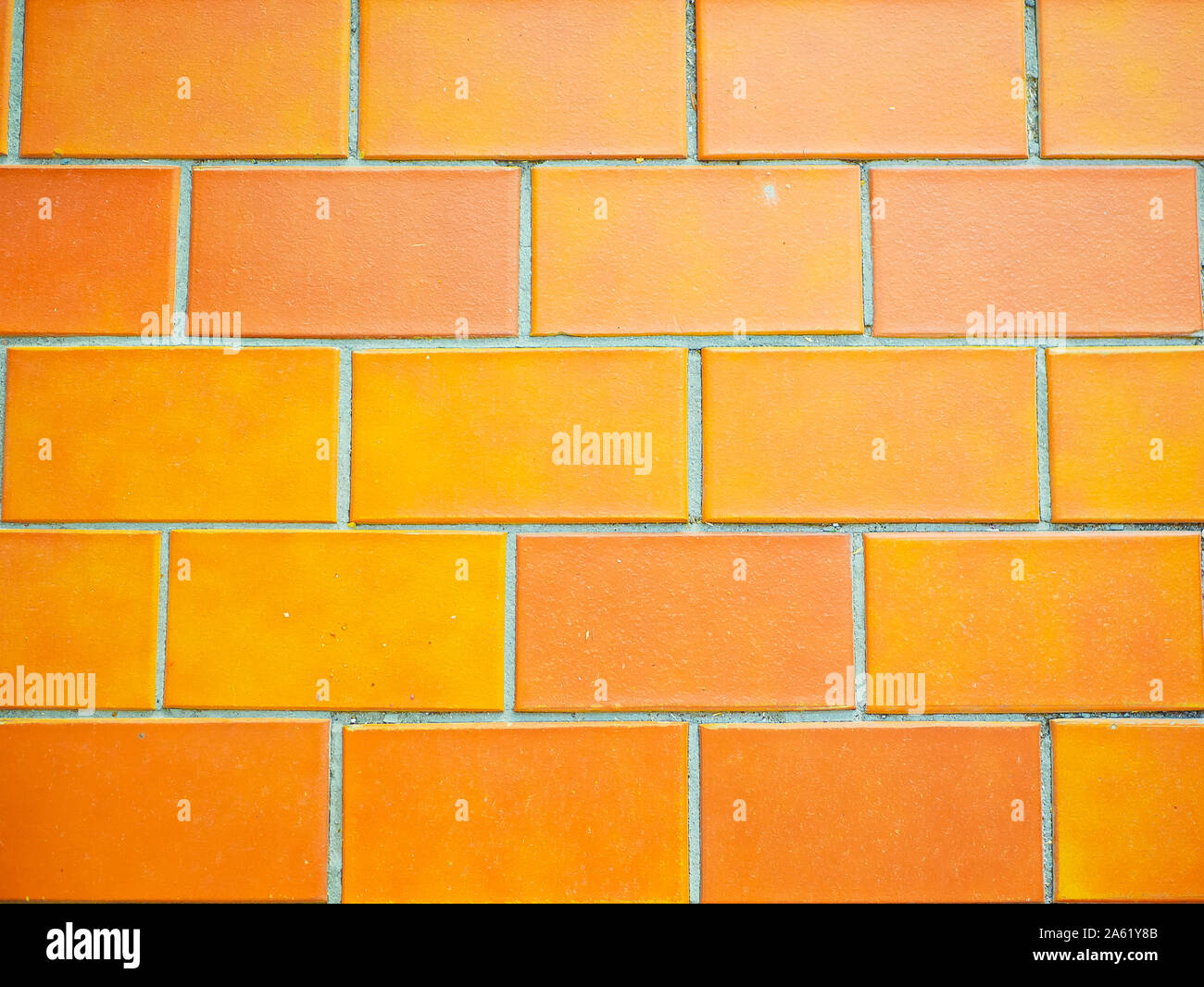 Les carreaux de mur orange libre. texture background. Brique Orange Wal Banque D'Images