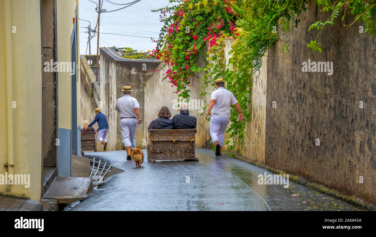 Luge Traîneau en osier à Monte,Funchal, Madère. 100 ans de tradition. Banque D'Images