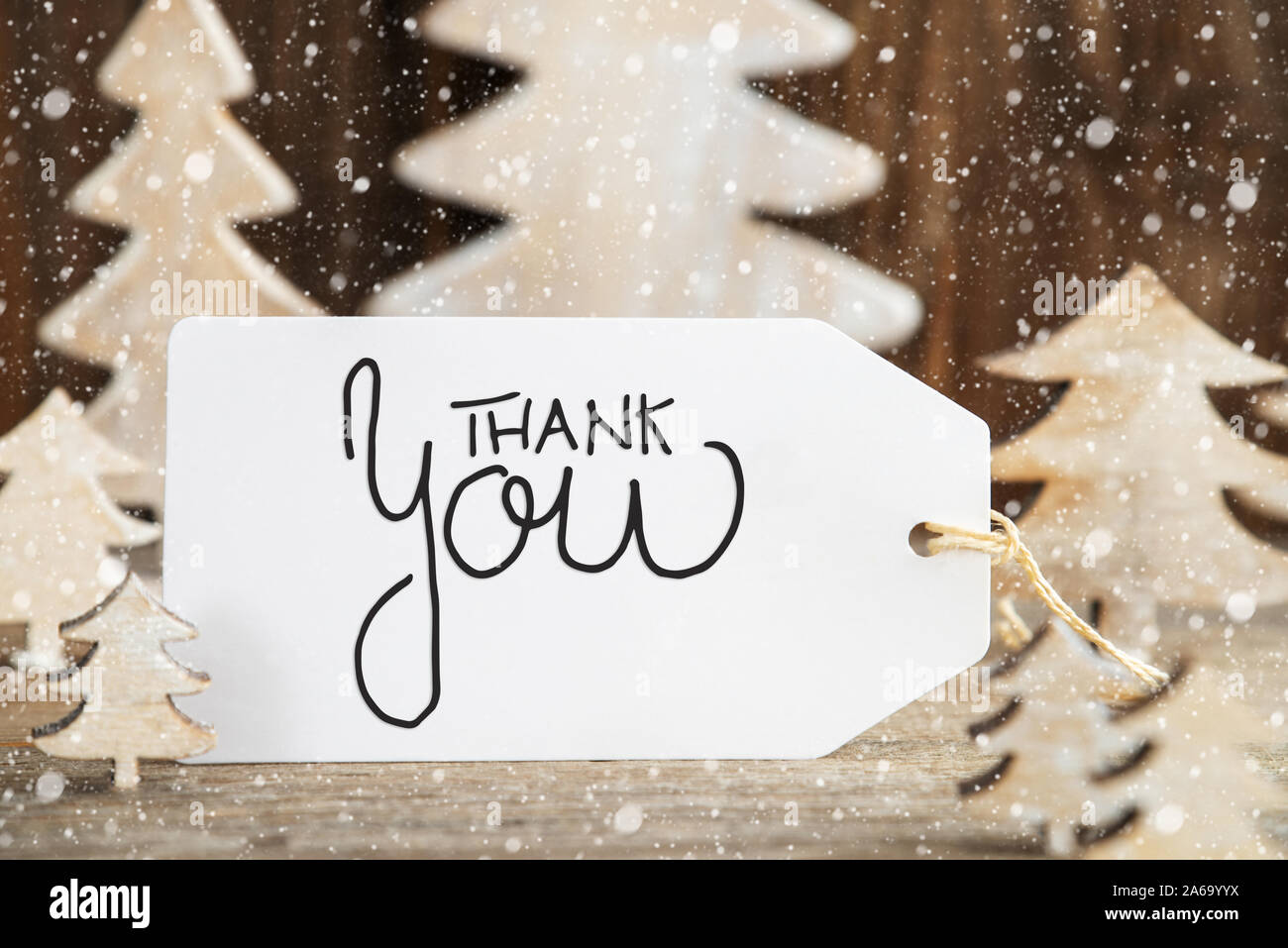 Arbre de Noël, l'étiquette avec la calligraphie anglaise Merci, Snowflakes Banque D'Images