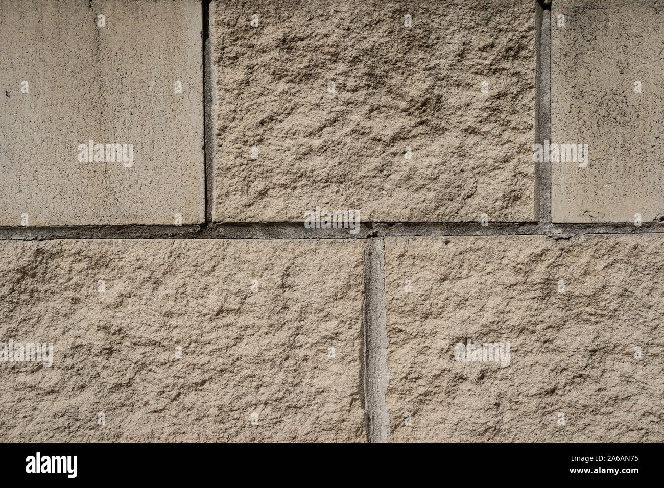 Blanc chaud, la texture du mur de grès. Banque D'Images