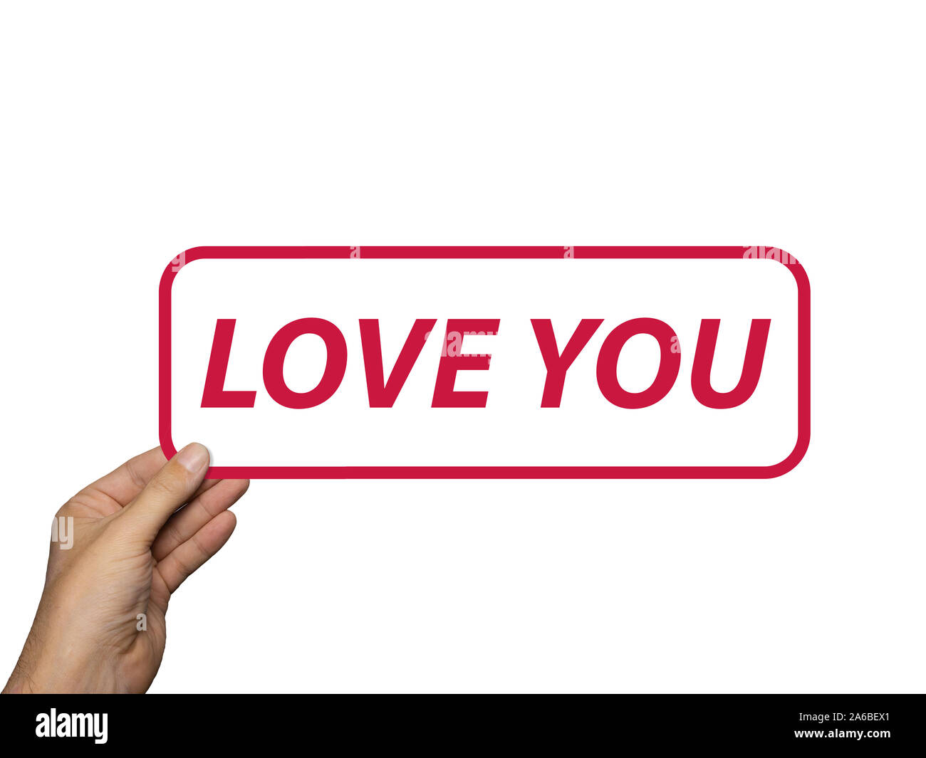 Hand holding card avec la phrase vous aime. isolé sur fond blanc. Composition minimale. Concept d'amour Banque D'Images