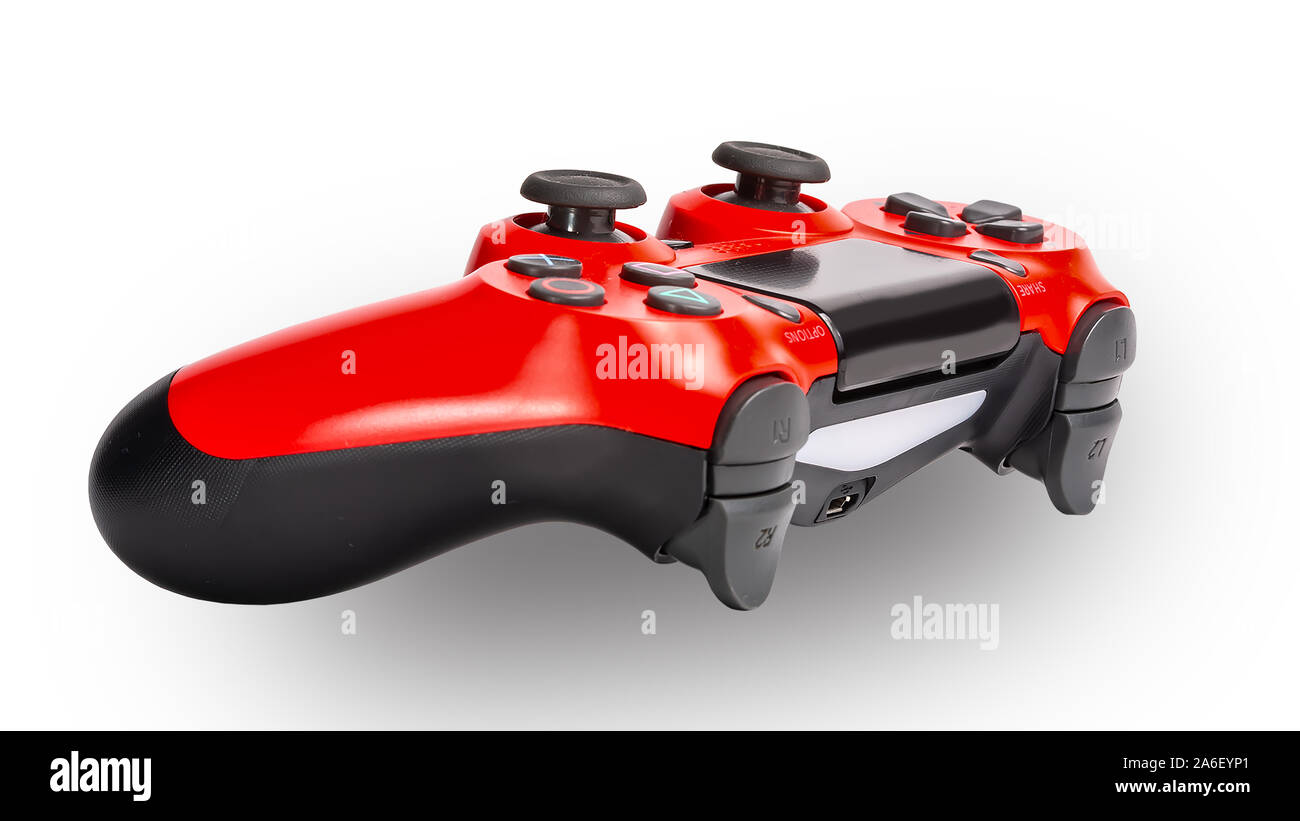 Manette PS3 rouge sur un arrière-plan uni, blanc avec aucun peuple ...