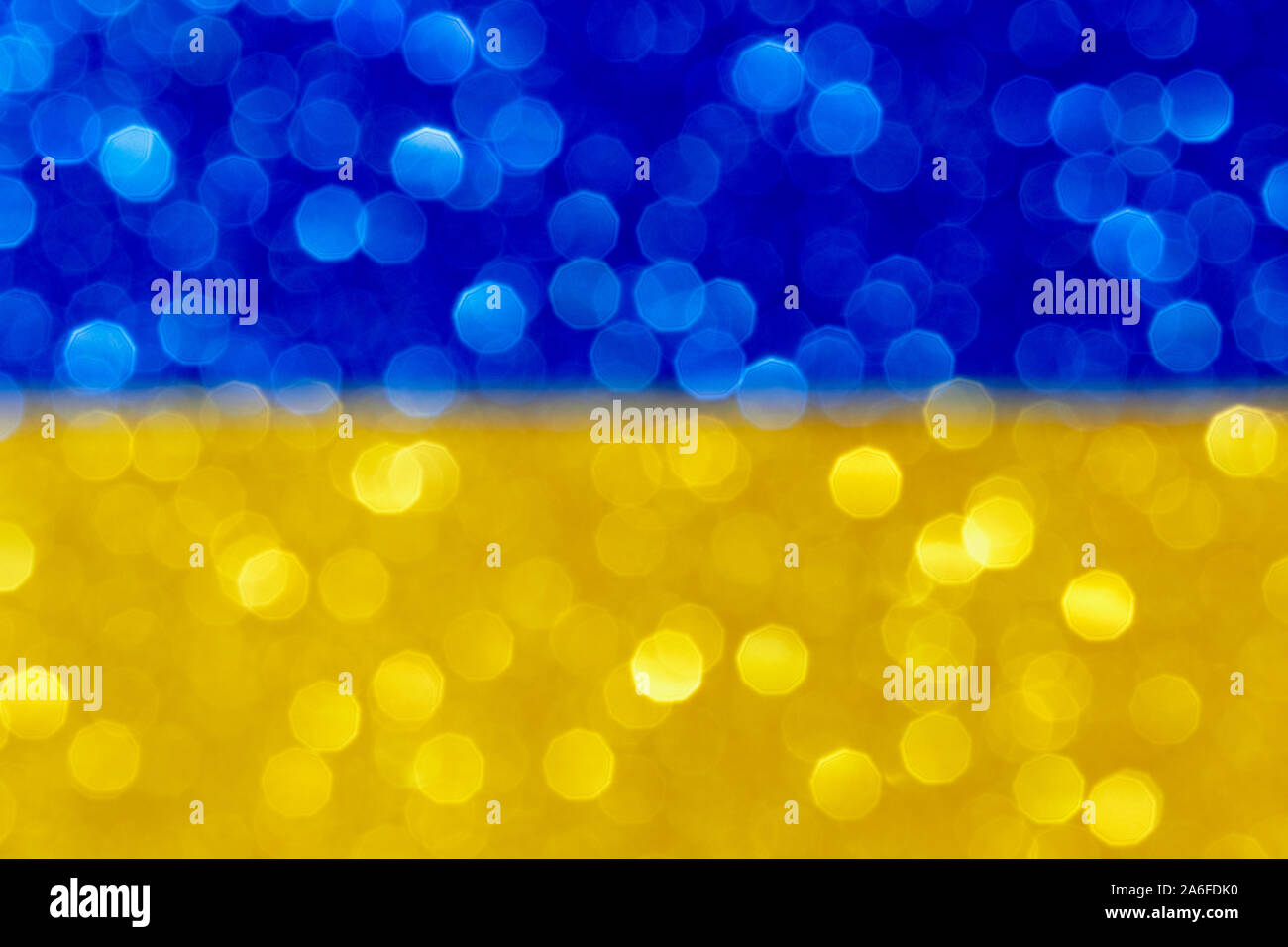 Abstrait bleu et jaune avec fond patriotique, Flou d'image festive avec effet de flou artistique glitter Banque D'Images