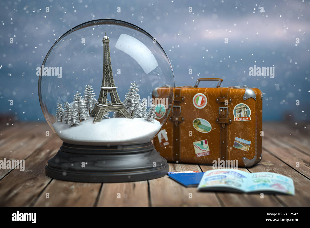 Tour Eiffel dans la boule à neige, vintage suitcase et passeports avec